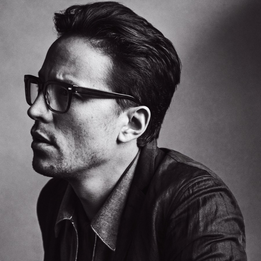 Cary Fukunaga poses for a black & white portrait, commissioned for Interview magazine.