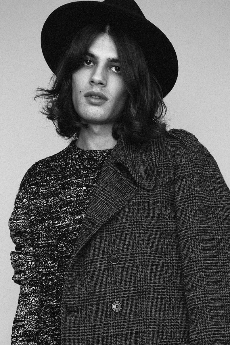 Álvaro wears coat Trussardi, sweater Religion and hat BKMTC.