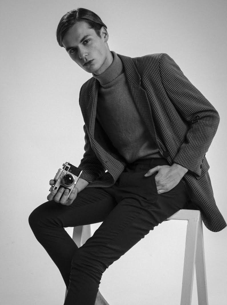 Filip wears jacket Laurel, turtleneck sweater and trousers H&M.