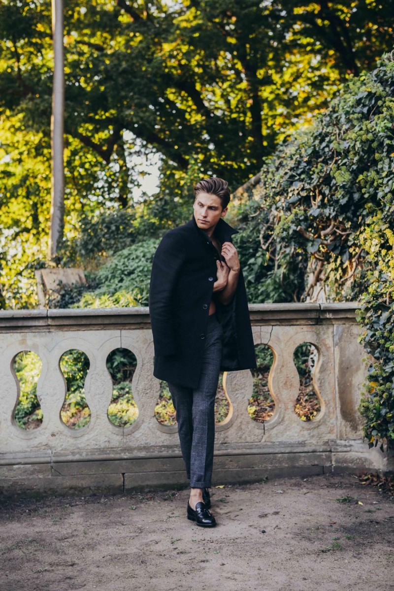 Phil wears coat Selected Homme and trousers H&M.
