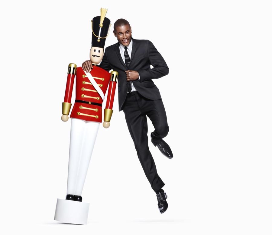 Suiting up for H&M, Roger Dupe poses with a nutcracker.