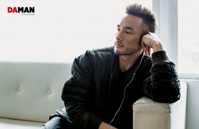Hidetoshi Nakata wears a jacket from Louis Vuitton.