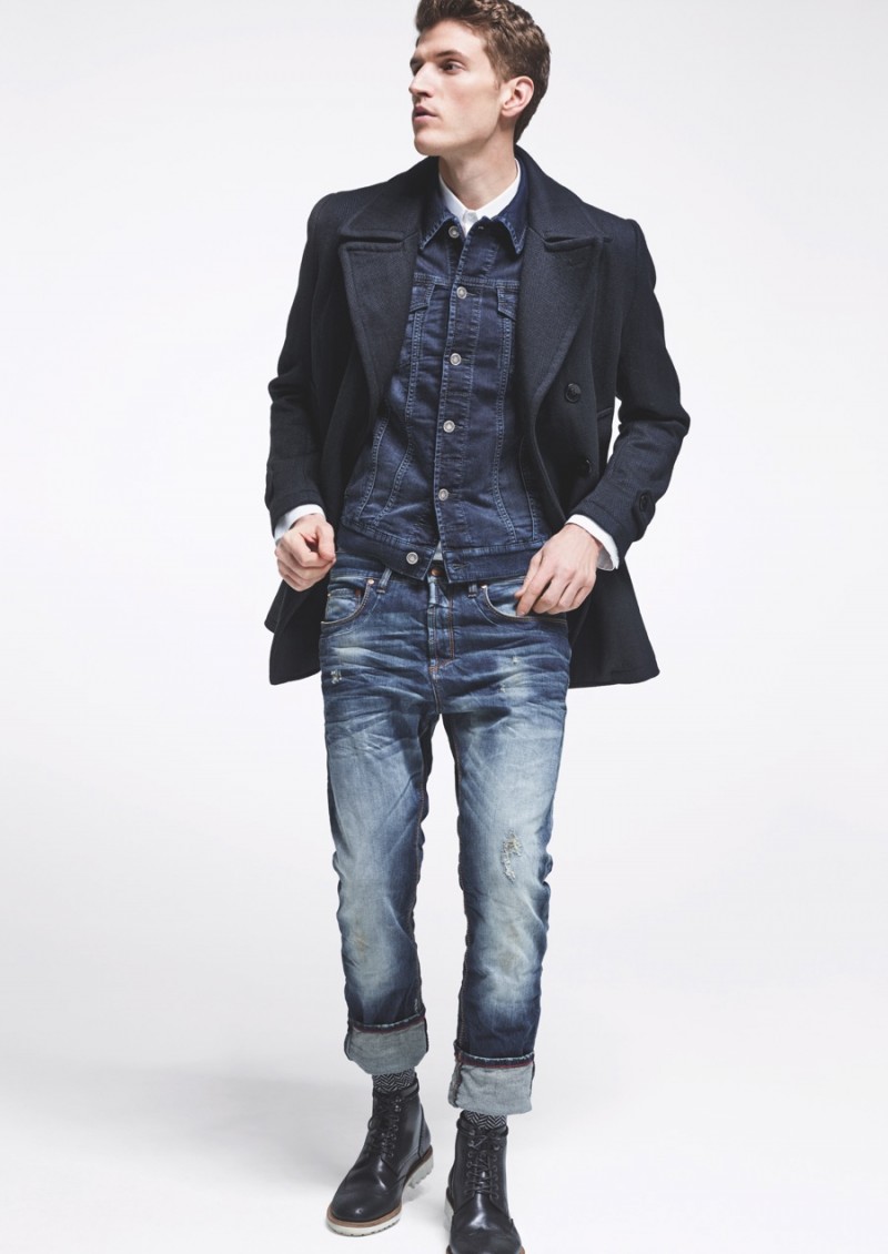 Andre wears a distressed denim look from MAC Jeans.