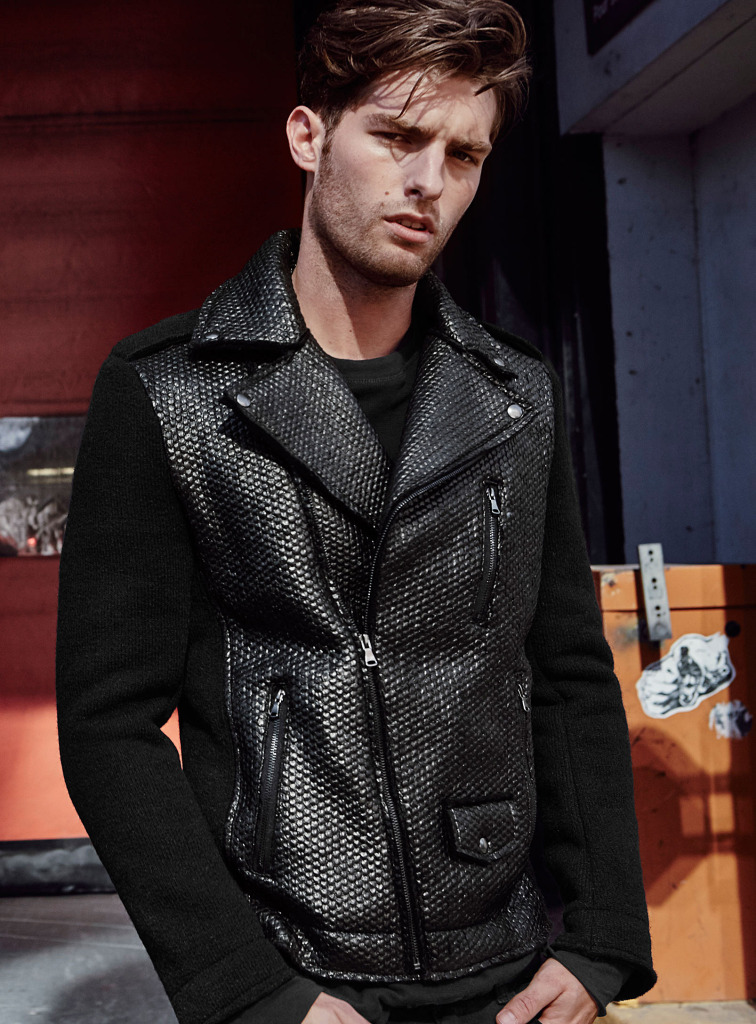 Paolo wears a quilted knit biker jacket for Simons.
