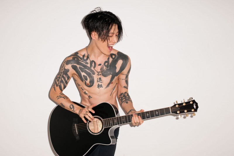 Miyavi goes shirtless, unveiling his tattoos.