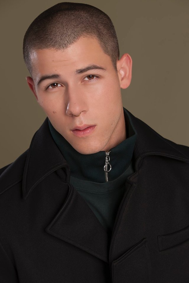 Nick Jonas rocks a septum ring for Phoenix magazine.