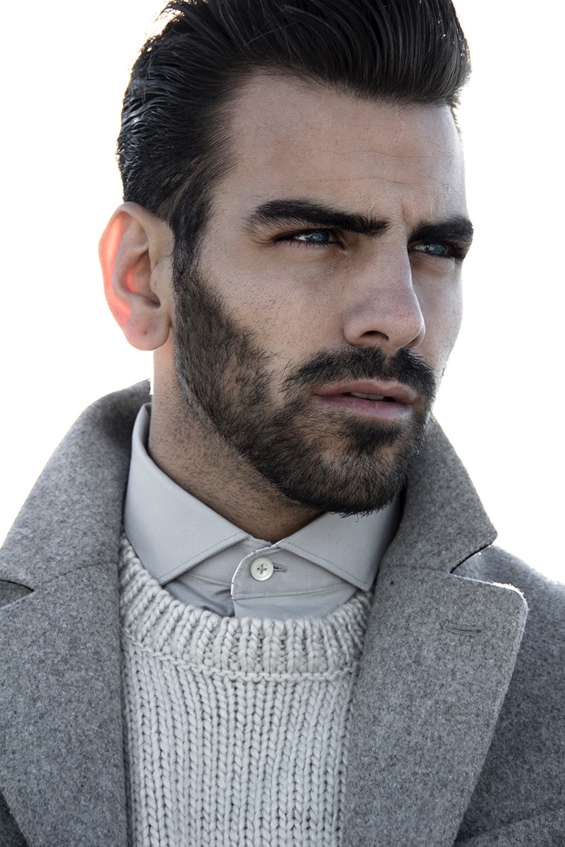 Nyle DiMarco wears coat Calvin Klein coat, sweater H&M and shirt Tiger of Sweden.