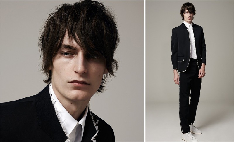 Stand-collar raw-edge blazer, harness short-sleeved cotton-blend shirt, raw-edge tailored trousers and quilted low-top leather trainers, all by Alexander McQueen.