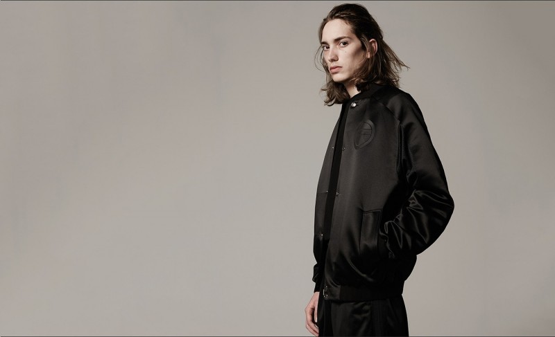 Logo-patch bomber jacket and knee-length shorts, both by Astrid Andersen.