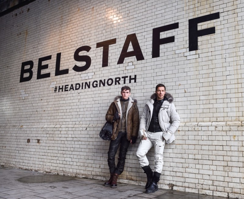 Models Anders Hayward and Paul Sculfor pose outside Belstaff's fall-winter 2016 presentation.