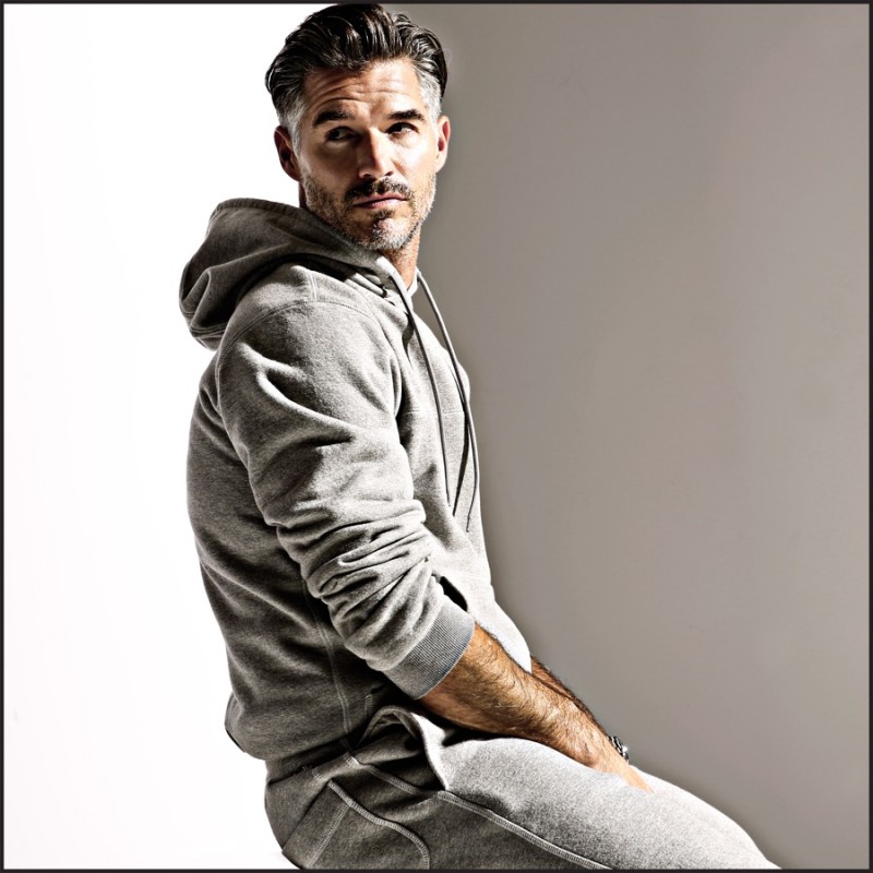 Eric Rutherford embraces an active attitude in a hooded pullover and sweats from Charlie by Matthew Zink.