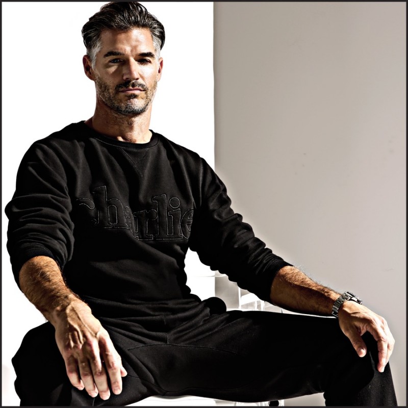 Showcasing Charlie's leisurewear, Eric Rutherford is photographed in a look from the brand's luxury sweat collection.