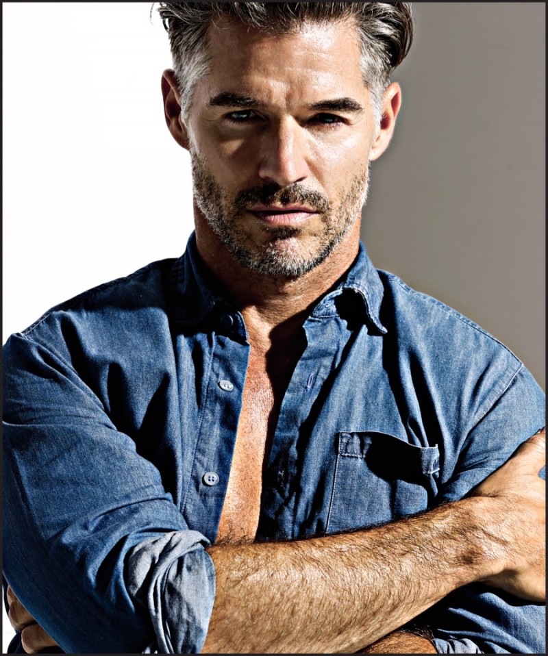 Eric Rutherford models a denim work shirt from Charlie by Matthew Zink.