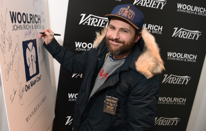 Charlie Day poses for a photo in Woolrich John Rich & Bros. at the 2016 Sundance Film Festival.