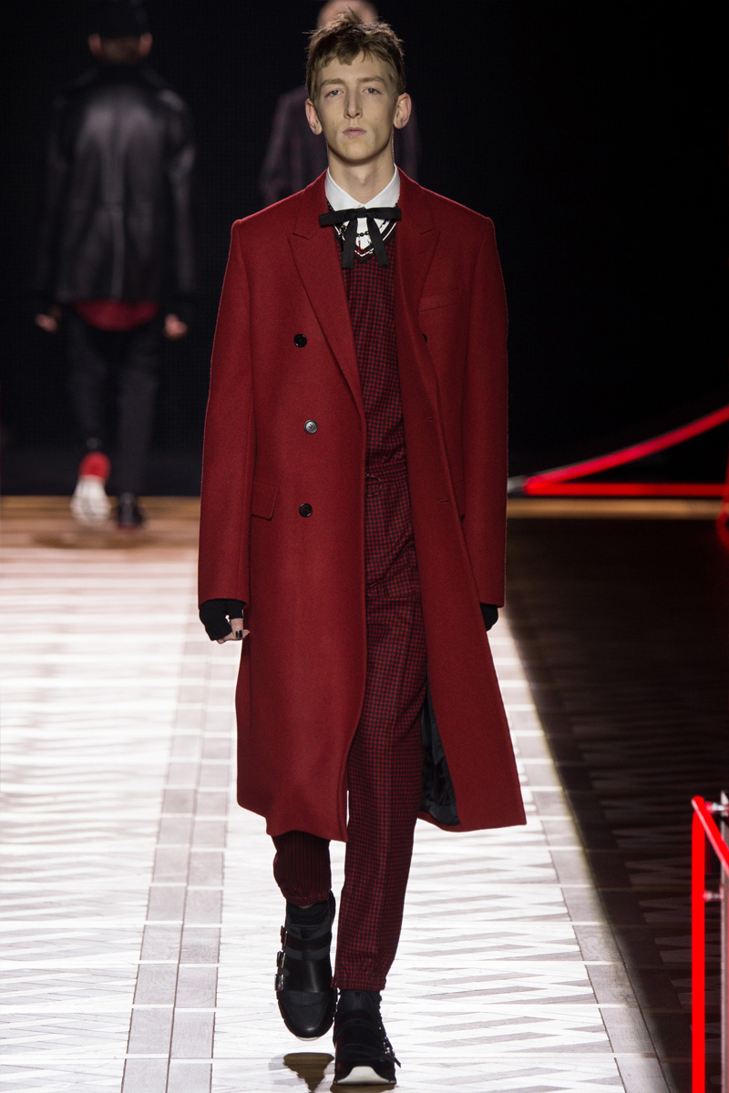 Dior Homme has a striking fall moment with a deep red double-breasted coat.