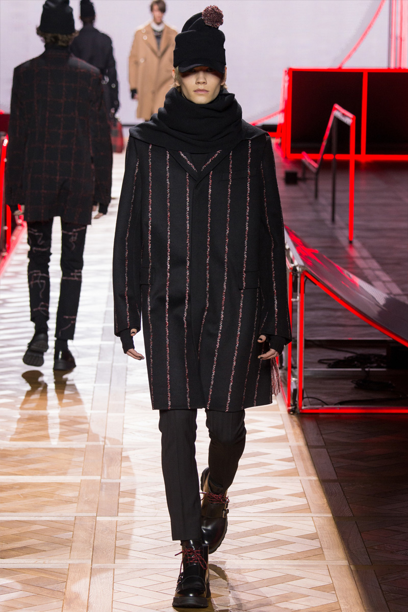 Dior Homme offers up a sharp pinstripe coat as part of its fall-winter 2016 collection.