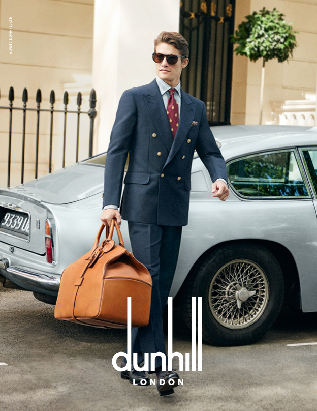 British model Danny Beauchamp dons a double-breasted Dunhill suit for the brand's spring-summer 2016 campaign.