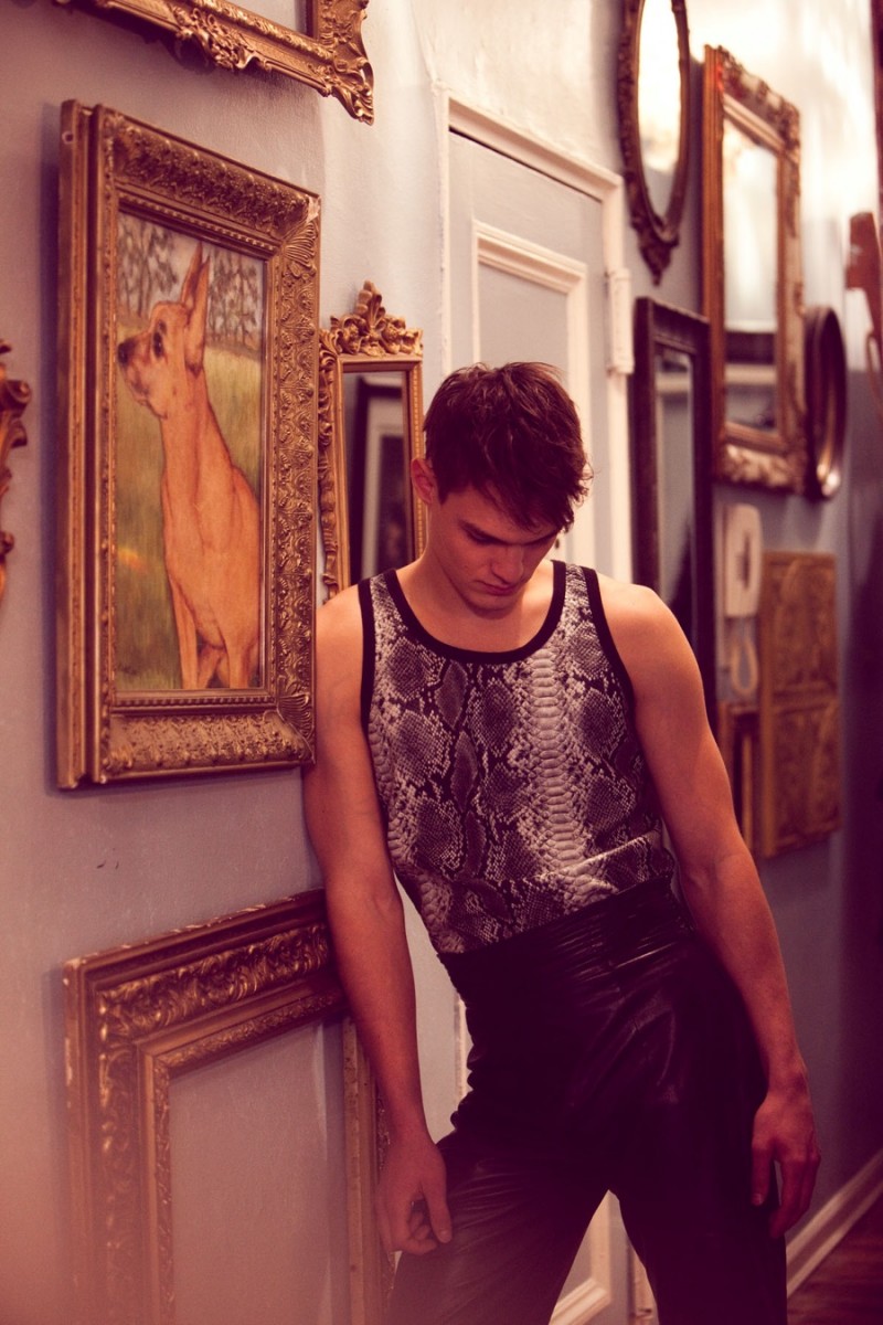 Christian wears tank and vintage trousers stylist's own.