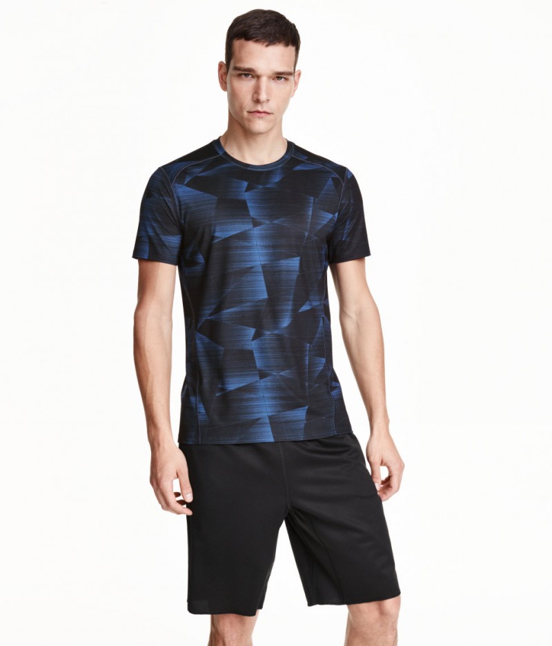 Alexandre Cunha models H&M sports shirt.