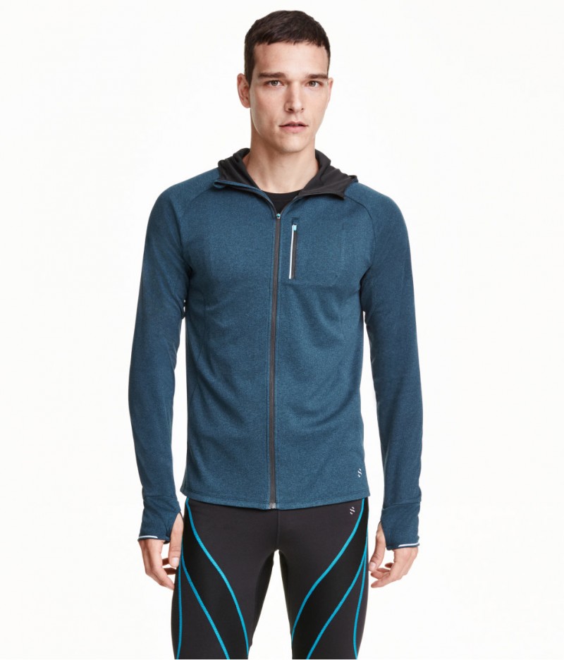 Alexandre Cunha models H&M running jacket.