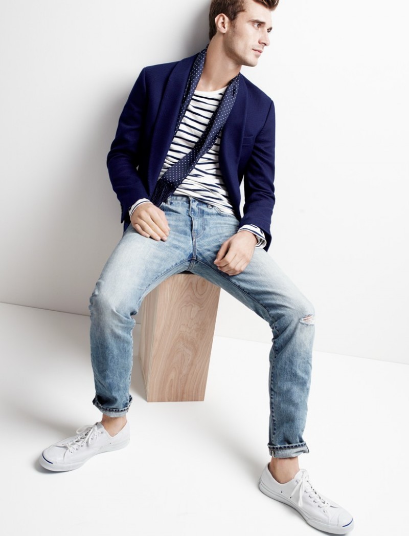 Clément Chabernaud wears Ludlow Shawl-Collar Dinner Jacket in Fiore Cotton, Long-Sleeve Deck Stripe T-Shirt, 484 Jeans in Tobias Wash, Converse Jack Purcell Signature Sneakers and Silk Dotted Scarf, all from J.Crew.