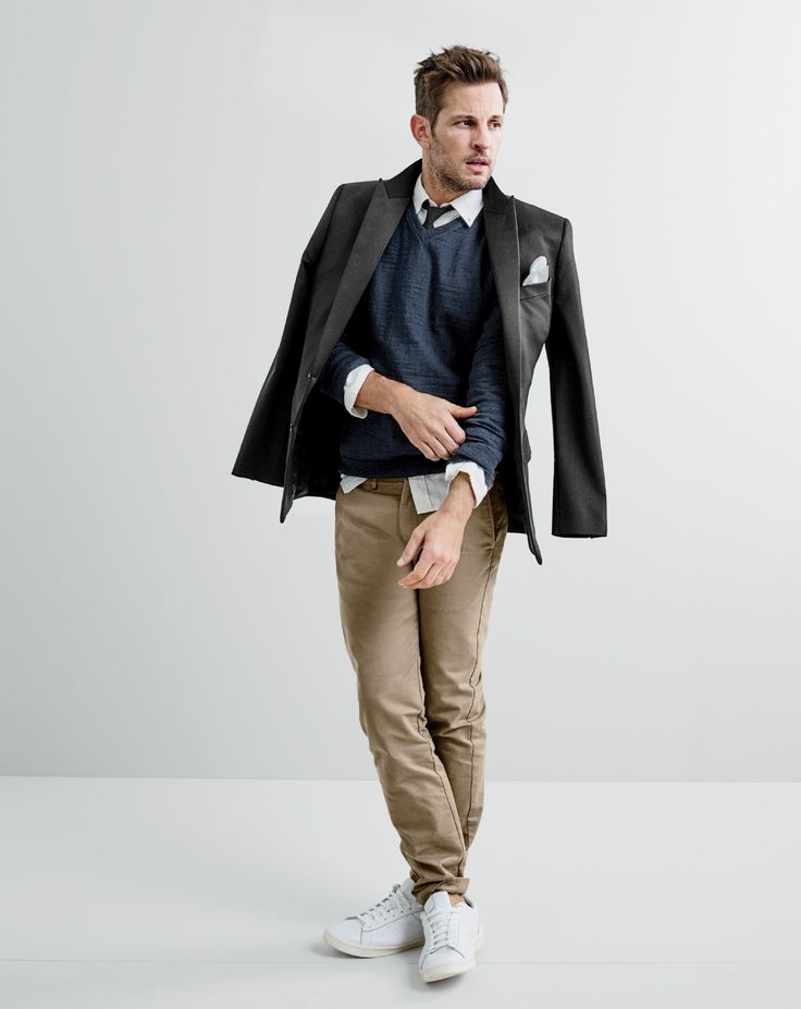 J.Crew men’s Ludlow tuxedo jacket, rugged cotton V-neck sweater, slim Irish linen shirt in solid, broken-in chino in 770 urban slim fit, tie in black, English linen pocket square and New Balance® 791 leather sneakers. 