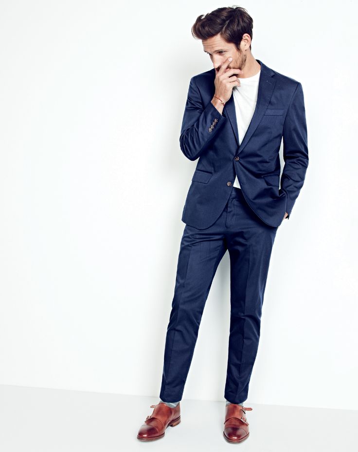 J.Crew men’s Crosby suit jacket in Italian chino, broken-in pocket T-shirt, Crosby suit pant in Italian chino and Alfred Sargent™ for J.Crew double monk strap shoes. 