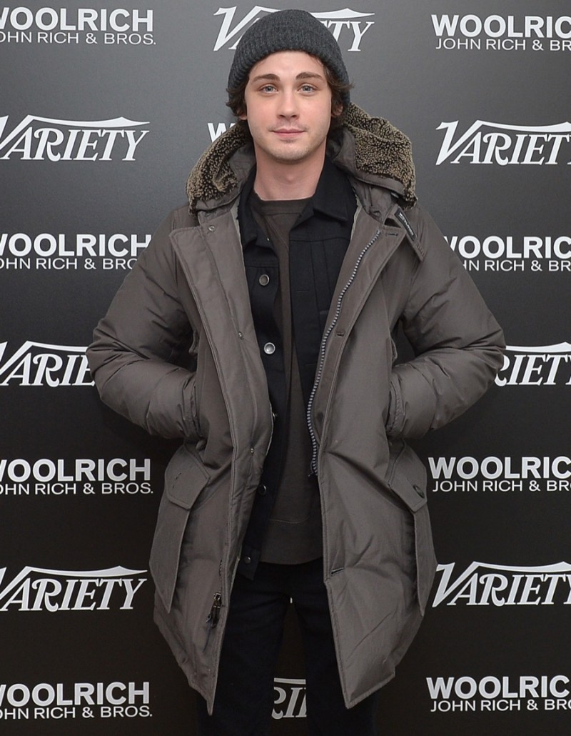 Logan Lerman poses for a photo in Woolrich John Rich & Bros. at the 2016 Sundance Film Festival.