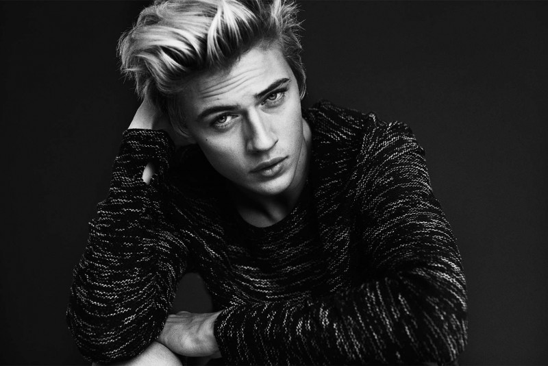 Lucky Blue Smith poses for a black & white image commissioned by H&M.