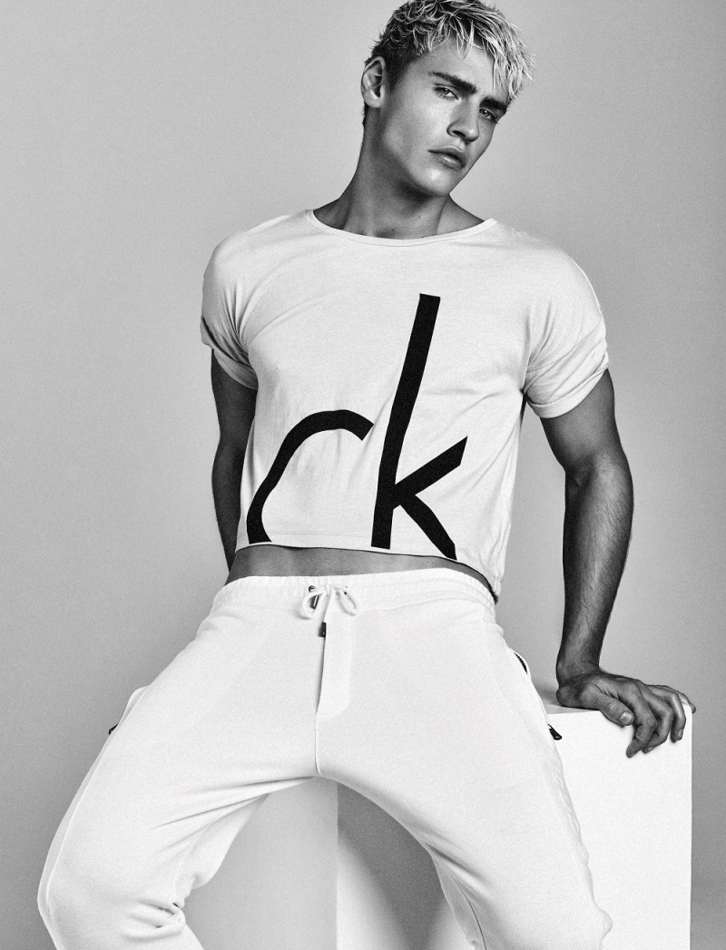Oliver Stummvoll wears a white look from Calvin Klein.