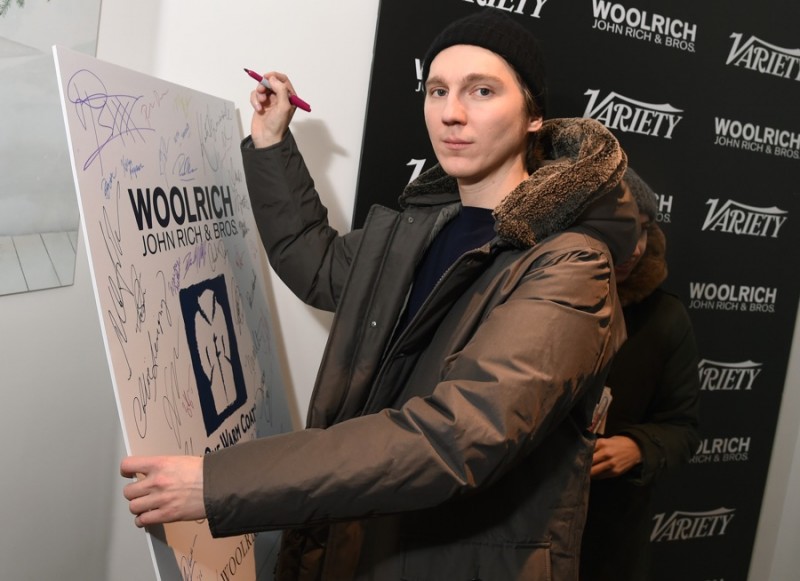 Paul Dano poses for a photo in Woolrich John Rich & Bros. at the 2016 Sundance Film Festival.