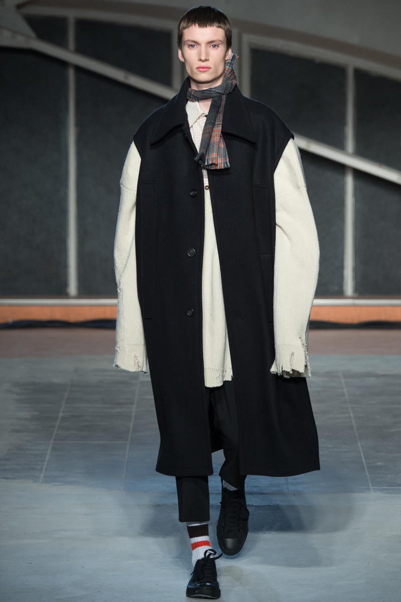Raf Simons' enlarged proportions are layered to bring the drama for fall-winter 2016.