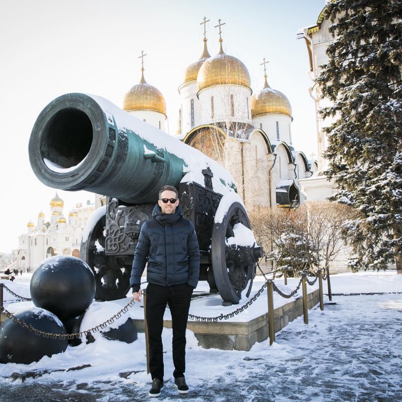 Bundling up for the Russian cold, Ryan Reynolds wears a quilted Moncler jacket with J Brand’s Tyler slim-fit jeans in Clancy and Louis Leeman sneakers.