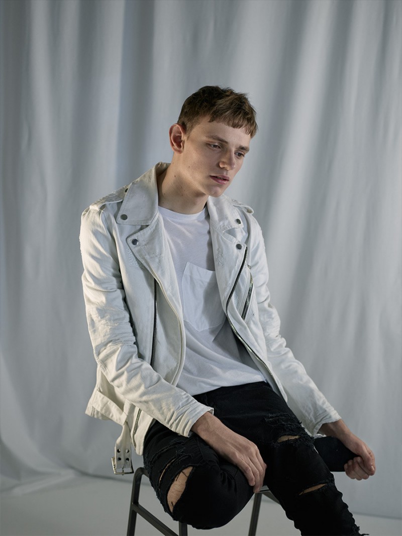 Designer Denim | From left: AMIRI destroyed denim jacket, DRIES VAN NOTEN cotton T-shirt, MAGIC STICK distressed jeans
