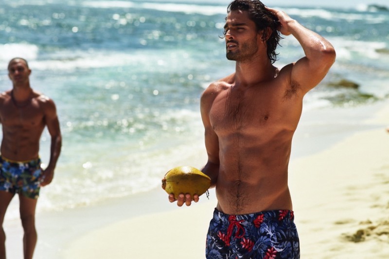Marlon Teixeira hits the beach, photographed behind the scenes of Tommy Hilfiger's spring-summer 2016 campaign.