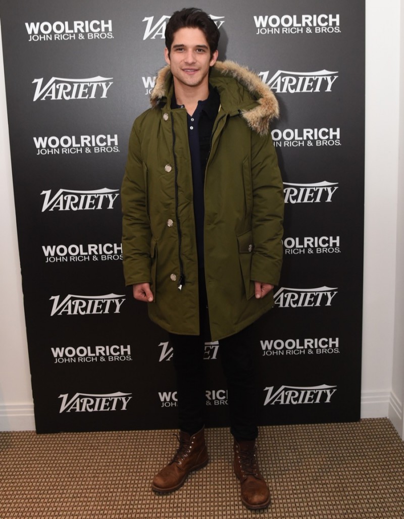 Tyler Posey poses for a photo in Woolrich John Rich & Bros. at the 2016 Sundance Film Festival.