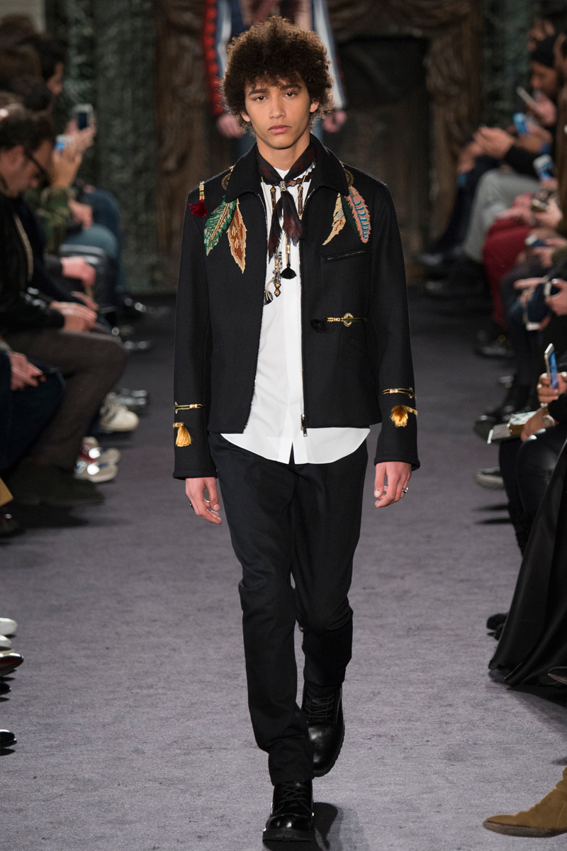 Valentino employs a feather motif for an embroidered jacket for fall-winter 2016.