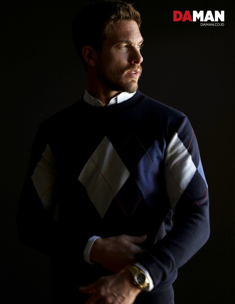 Adam Senn embraces argyle with a spring sweater from Dior Homme.