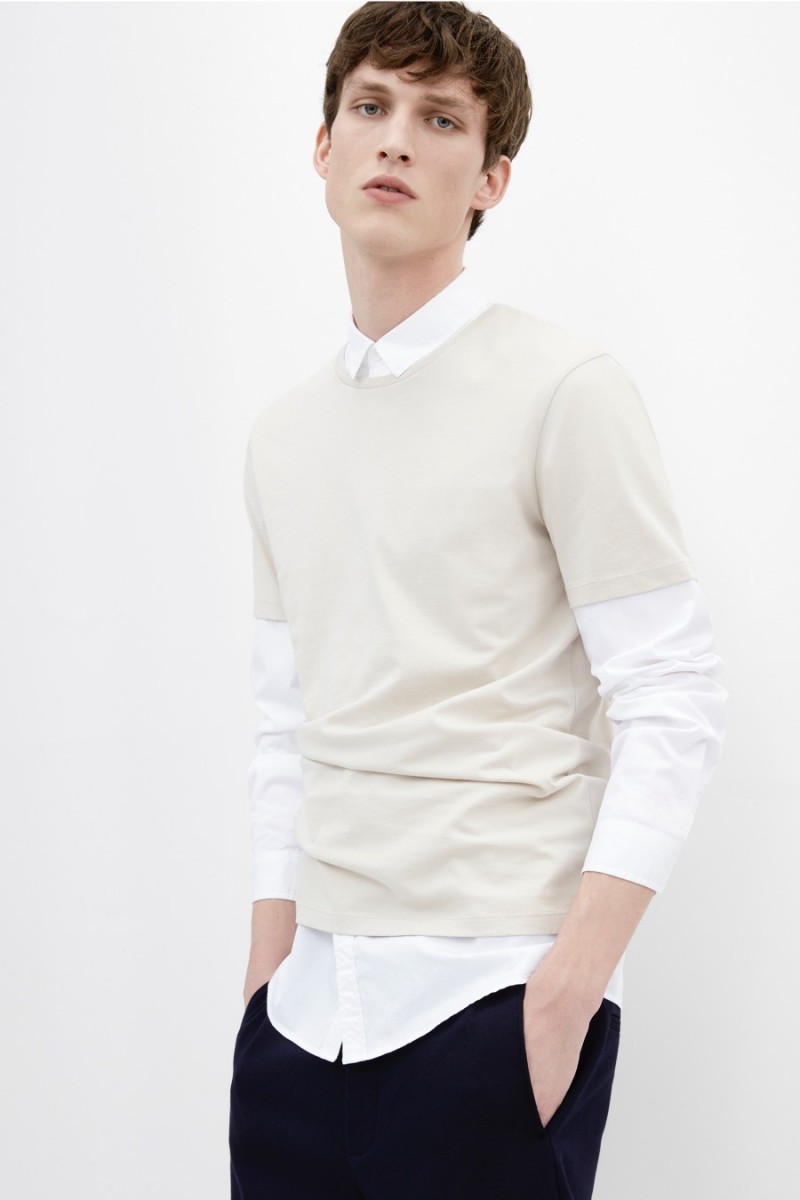 Malthe Lund Madsen wears a COS round neck t-shirt with a cotton twill shirt and elasticated cuff trousers. » New Arrivals: COS Updates Everyday Essentials Malthe Lund Madsen wears a COS round neck t-shirt with a cotton twill shirt and elasticated cuff trousers.