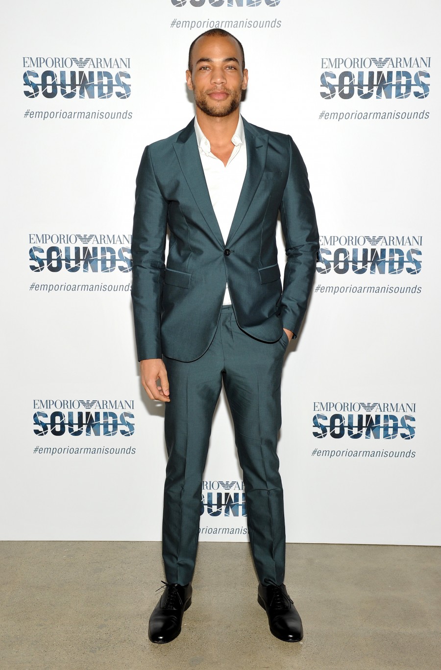 Wearing Emporio Armani, Kendrick Sampson poses for pictures at Emporio Armani Sounds.