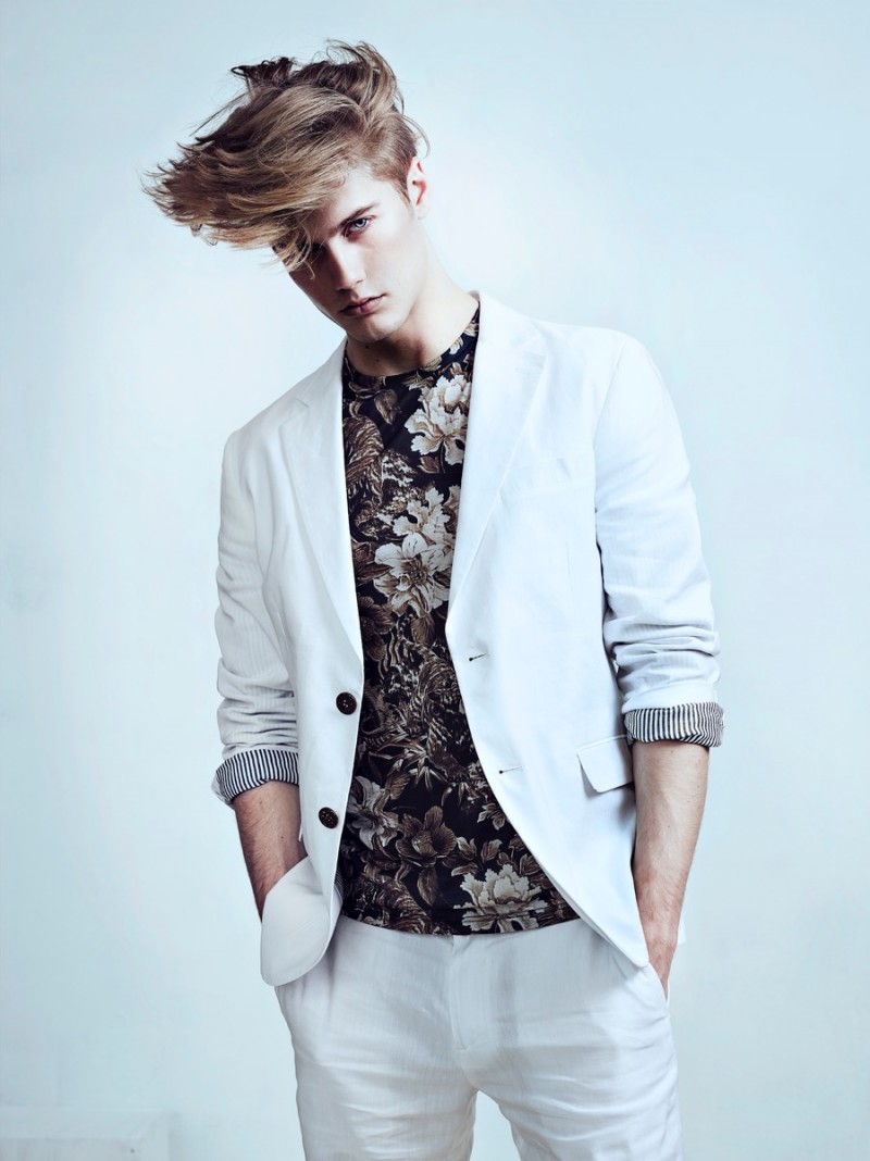 Neels wears floral print t-shirt Topman, jacket and shorts Jacob Halston.