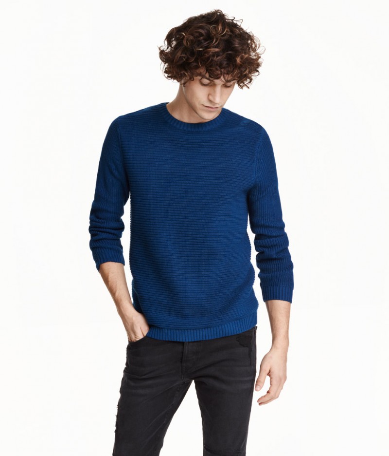 Miles McMillan sports a rib-knit sweater from H&M.