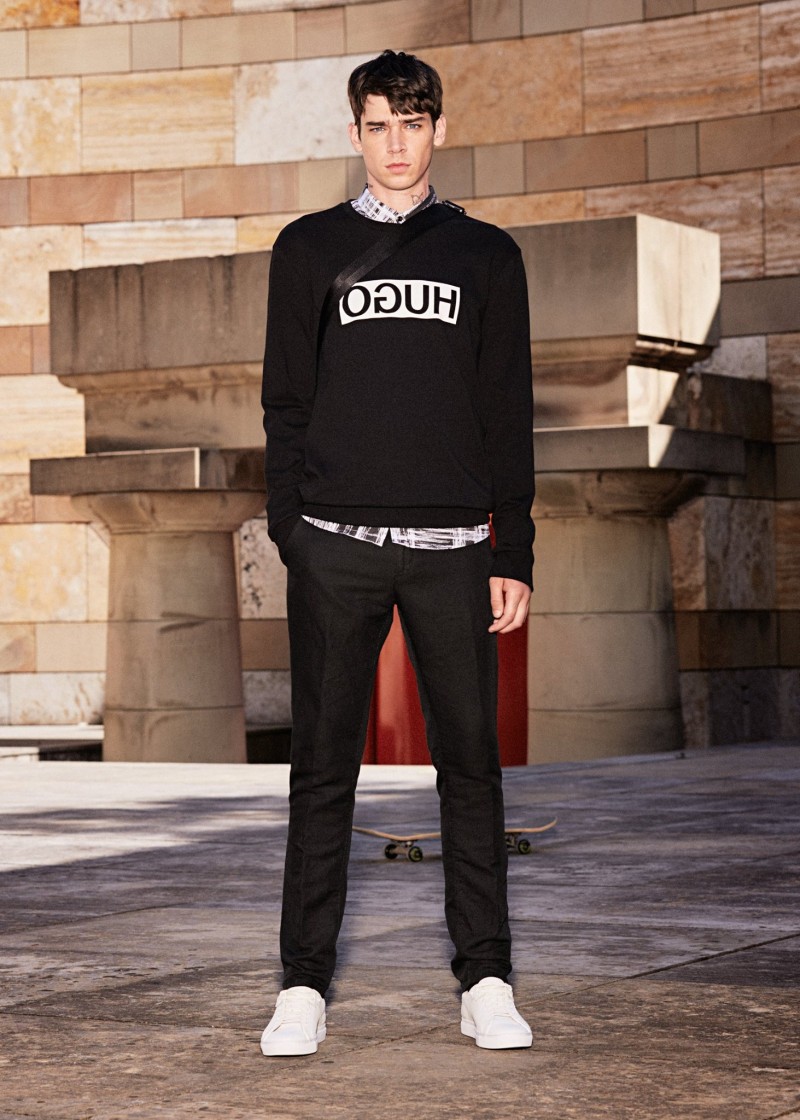 Cole Mohr models a HUGO sweatshirt from the brand's latest collection.