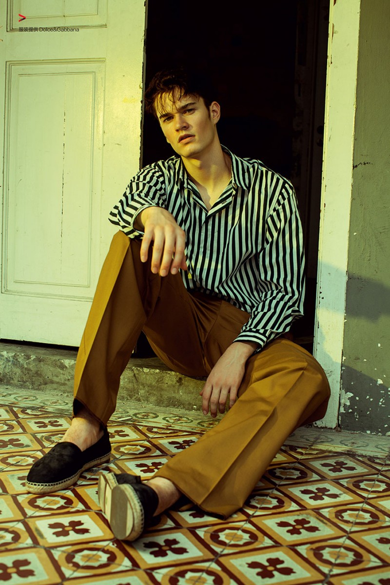 Charles Markham models relaxed tailoring from Italian fashion house Dolce & Gabbana.