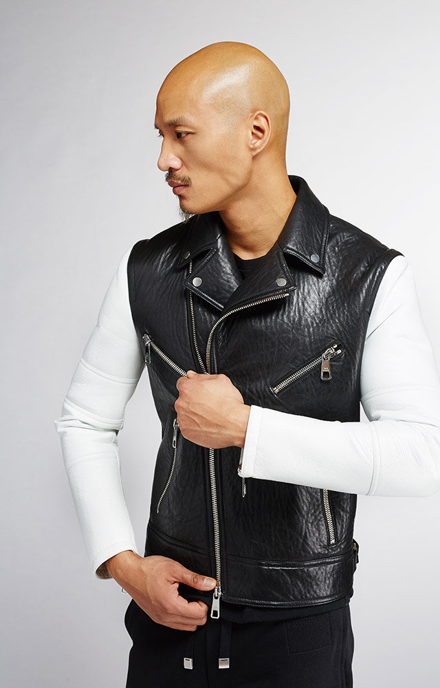 Paolo Roldan wears black & white leather biker jacket Neil Barrett, black & white stripe tee Alexander McQueen and joggers Balenciaga. » Holt Renfrew Rounds Up Strong Black & White Looks Paolo Roldan wears black & white leather biker jacket Neil Barrett, black & white stripe tee Alexander McQueen and joggers Balenciaga.