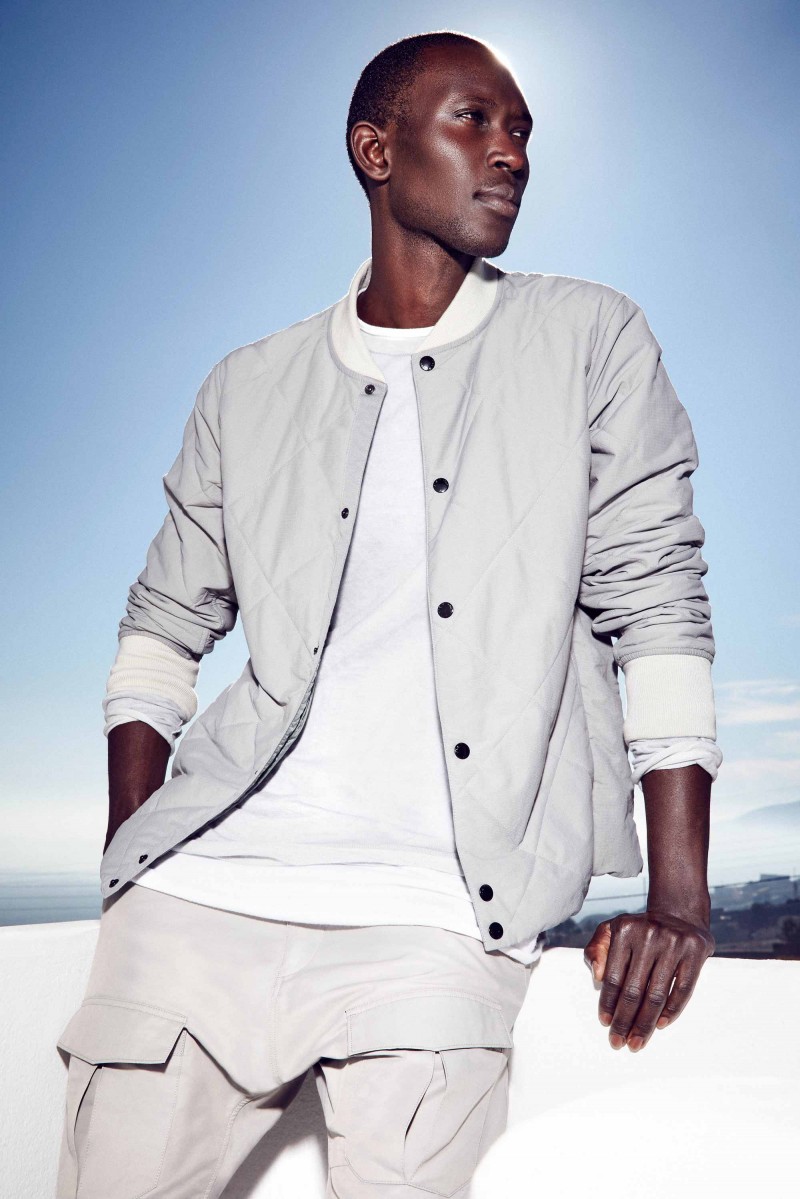 Armando Cabral relaxes in greys from Rag & Bone.