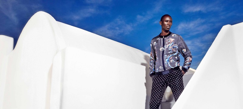 Armando Cabral mixes patterns, wearing fashions from Dolce & Gabbana.