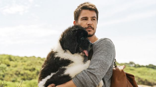 Photographed by Bruce Weber, Josh Hartnett poses with a dog for Marc O'Polo's spring-summer 2016 campaign.