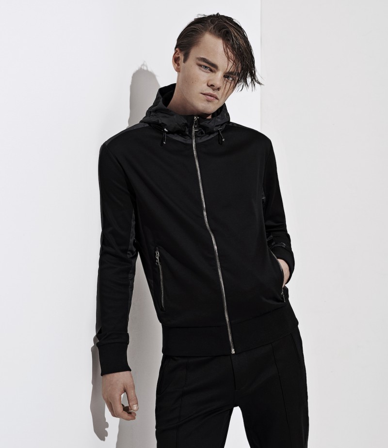 Konrad Annerud sports a leisure look from Ralph Lauren Purple Label for Barneys New York.