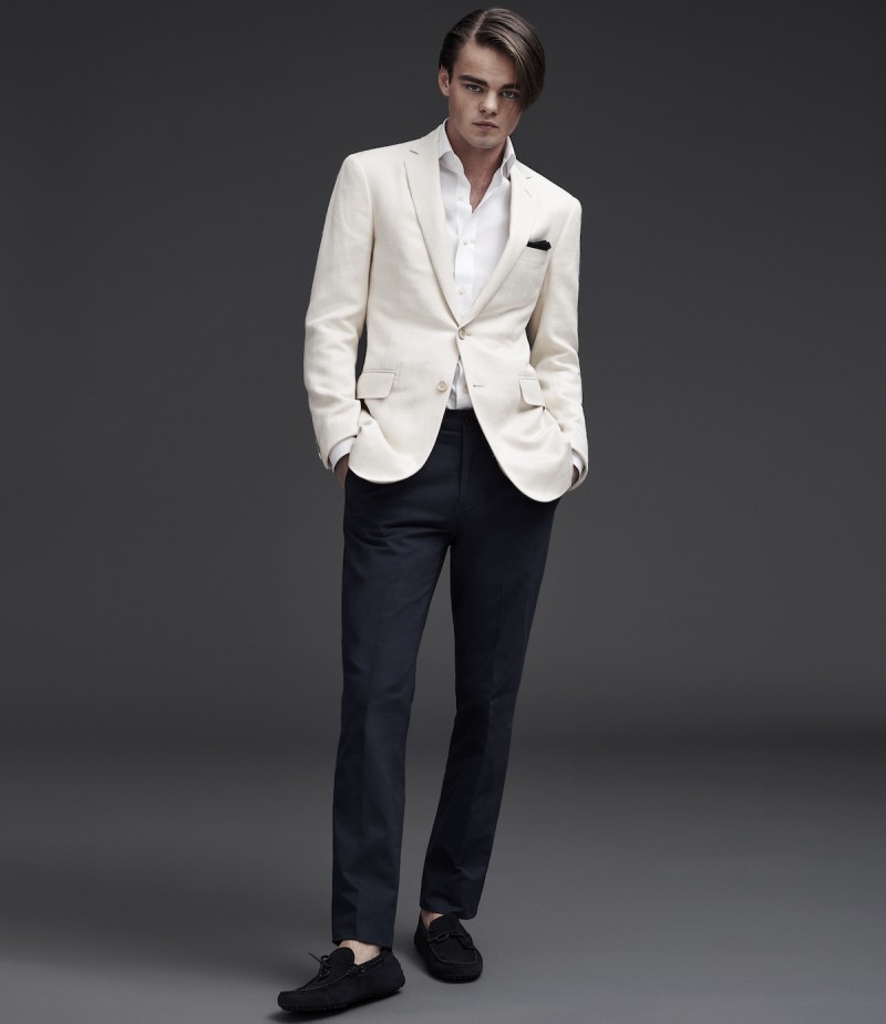 Konrad Annerud is dashing in a white jacket from Ralph Lauren Purple Label.